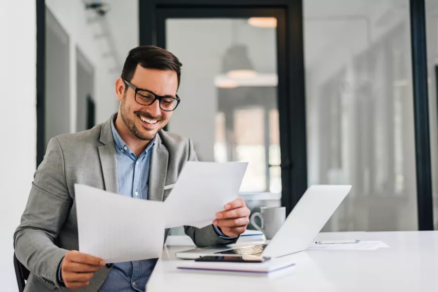 Man working and reading documents