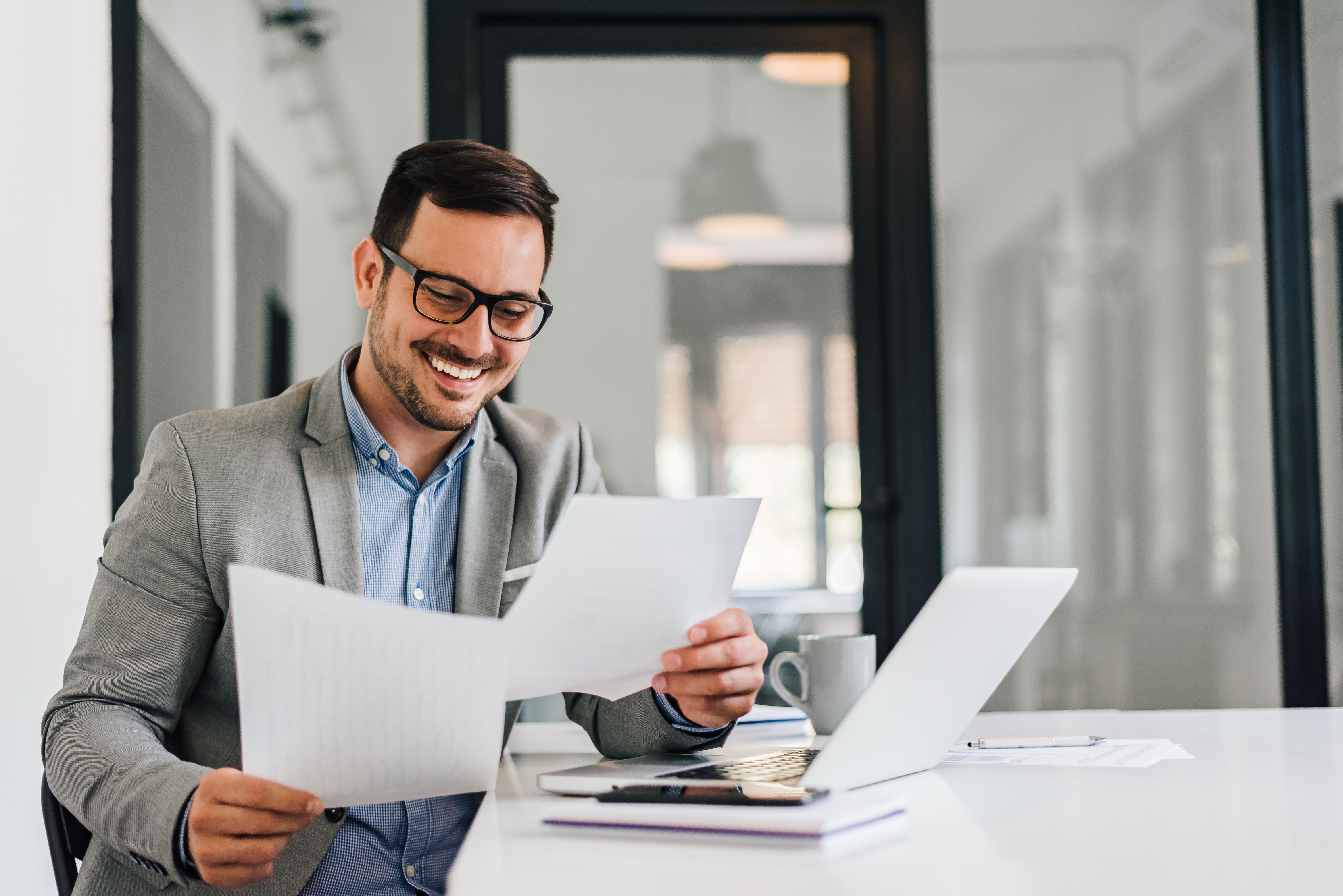 Man working and reading documents